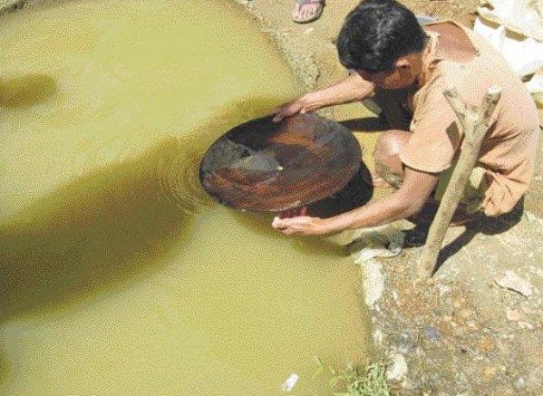 One of many local, small-scale gold panners in the area surrounding Mindoro Resources' Agata gold project in northern Mindanao, Philippines.