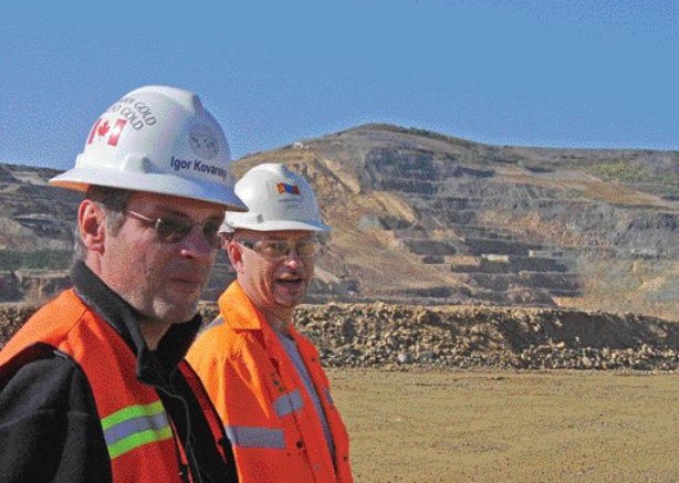 BY ANTHONY VACCAROSite supervisor Curtis Church (right) and Igor Kovarsky, vice-president of government affairs with Centerra Gold subsidiary Boroo Gold Co., stand near the open pit of the Boroo gold mine in Mongolia. The mine will produce roughly 275,000 oz. gold this year.