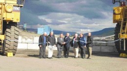 VIVIAN DANIELSONBill Bennett (centre), British Columbia's minister of state for mines, cuts the ribbon to mark the official opening of the Wolverine coal mine, near Tumbler Ridge, B.C. Bennett is flanked by Shoichiro Yonezawa and Western Canadian Coal chairman John Byrne, as well as other dignitaries. Also on hand were WCC president Gary Livingstone (far left) and local MP Jay Hill (holding ribbon).