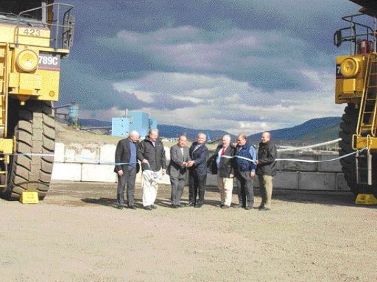 VIVIAN DANIELSONBill Bennett (centre), British Columbia's minister of state for mines, cuts the ribbon to mark the official opening of the Wolverine coal mine, near Tumbler Ridge, B.C. Bennett is flanked by Shoichiro Yonezawa and Western Canadian Coal chairman John Byrne, as well as other dignitaries. Also on hand were WCC president Gary Livingstone (far left) and local MP Jay Hill (holding ribbon).