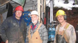 Taking a break from drilling on the East Emerald zone at Sultan Minerals' Jersey Emerald property in southeastern British Columbia. From left: Richard Lawrick of Prospector Diamond Drilling, Sultan project manager Ed Lawrence, and driller's helper David Little.