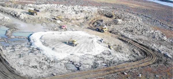 AGNICO-EAGLE MINESTrucks clear a spot for a fuel storage facility at Cumberland Resources' Meadowbank gold project in Nunavut. Toronto-based Agnico-Eagle Mines has made a friendly takeover offer for the company.