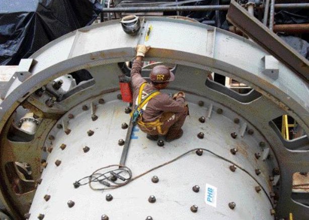 BY ANTHONY VACCAROA Jaguar Mining technician examines a ball mill at the Turmalina gold operation in Minas Gerais state, Brazil.