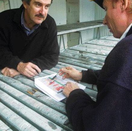 WESTERN AREASWestern Areas president and CEO Julian Hannah examines core with another geologist at the Forrestania nickel project in Australia.