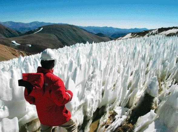 BY PAUL HARRISBarrick Gold has agreed to mine around three glaciers (one of which is pictured) that lie over gold-bearing property at the Pascua Lama gold project, which straddles Chile's Region III and Argentina's San Juan province. The decision cut reserves from 18.3 million oz. to 17 million oz., which means that 1.3 million oz. will be left in the ground.