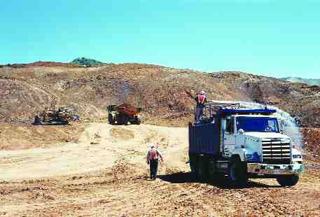 BY JOHN CUMMINGBuilding of the heap leach pad at Glencairn Gold's Bella Vista gold mine in 2004. The leach pad at the mine is sliding downhill at a rate of 1 cm per day.