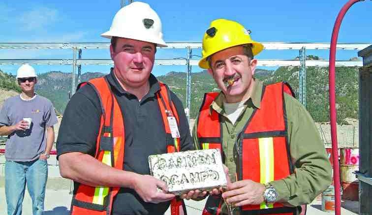 GAMMON GOLDBetter days: Former Gammon Lake CEO Brad Langille (left) and current president and chairman Fred George hold a 30-kg gold-silver dor bar from the company's first metal pour in February 2006 at the Ocampo gold mine in Chihuahua state, Mexico.GAMMON, From Page 1