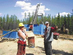 PUREPOINT URANIUMDrill foreman Dave Whitbread (left) and Purepoint Uranium's senior geologist Peter Daubeny discuss where to place a drill at Purepoint's Red Willow uranium project, in northern Saskatchewan.