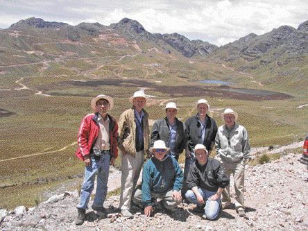 BY STEPHEN STAKIWNorthern Peru Copper's team at the Galeno project in Peru in early 2006: (back row, from left) senior geologist Carlos Miranda; country manager Hal Waller; president and CEO Marshall Koval; vice-president of exploration Leo Hathaway; and director Tony Floyd. In front is project manager Jeff O'Toole (left) and vice-president of corporate development David Strang. The main deposit and exploration camp are in the background.