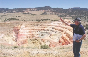 Gryphon Gold's vice-president of exploration, Steven Craig, indicating a structural trend at the Borealis project, in Nevada.