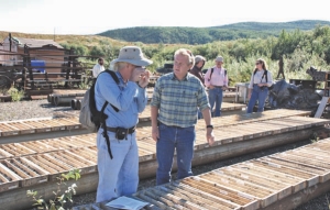 International Tower Hill Mines president and CEO Jeff Pontius (right) discusses drill core with Bob Moriarty at the Livengood project in Alaska.