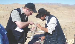 VP of exploration Leo Hathaway and chief geologist Fabian Figueroa examine core from the Las Guias zone at Relincho.