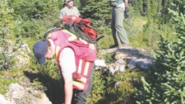 Aurora Energy's chief geoscientist Rick Valenta uses a scintillometer to test for uranium mineralization in trenches on the Michelin deposit in Labrador's Central Mineral Belt.