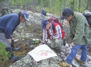 Forum Uranium president and CEO, Rick Mazur (centre) and chief geologist Boen Tan (right) with another Forum exploration geologist, in Saskatchewan.
