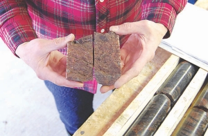 Examining core samples at Great Western Minerals' Hoidas Lake rare earth elements project, in northern Saskatchewan. The company is deciding whether to develop phosphate as a byproduct to cash in on climbing fertilizer prices.