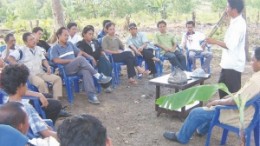 Rubber farmers in Indonesia receive training from a local university as part of participatory development planning.