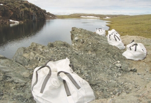 Megabags surround the AV1 outcrop at Stornoway Diamond's Aviat project, on the Melville Peninsula in Nunavut, last summer. A total of 49 tonnes of kimberlite were extracted from AV1 and processed by dense media separation, returning 43.41 carats of diamonds, or 89 carats per hundred tonnes.