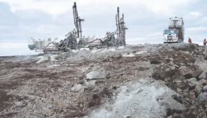 Drilling the rugged landsape at Agnico-Eagle Mines' 100%-owned Meadowbank gold property, in Nunavut, 70 km north of Baker Lake, near the western shores of Hudson Bay. The company plans to begin production at the open-pit mine by the beginning of 2010.