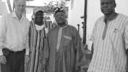 From left: Richard Redfern, president of Mexivada Mining, poses with Chief S. M. Gborie and two other chiefs from the Gbense Chiefdom, outside of Mexivada's Yaradu, Sierra Leone, headquarters. The Gbense Chiefdom will earn a 30% share of the net profit of diamonds found by Mexivada in the area. Inset: Artisanal miners employed by Mexivada's local partner Pink Diamond Exploration use a Hartz Jig for diamond concentrating at North Kono, Sierra Leone.