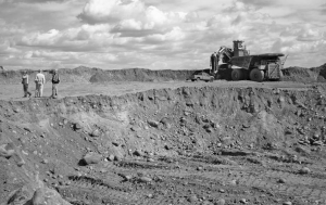 A truck and loader work at Athabasca Minerals' Susan Lake aggregates pit, 85 km north of Fort McMurray, Alta.