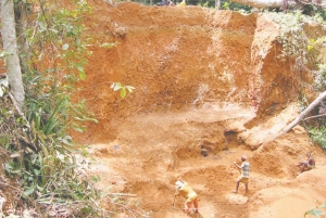 Artisanal gold workings at the Fula camp on African Aura Resources' North Bea licence in Liberia.