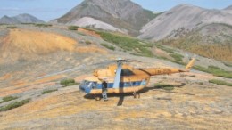 A helicopter rests at Fortress Minerals' Svetloye gold project in Russia's Far East.