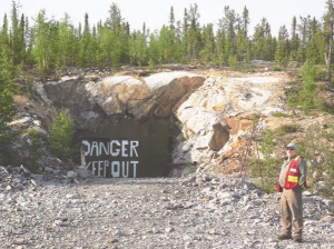 Tyhee Development's chief exploration geologist, Val Pratico, stands before the portal to the now-flooded Nicholas decline, at the Yellowknife gold project, in the Northwest Territories.