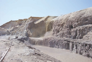 Hydraulically mining the Buffels No. 2 tailings dam at Gold Wheaton Gold's Mine Waste Solutions (MWS) project, in the western portion of South Africa's Witwatersrand basin.