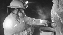 A worker chips away samples at Iberian Minerals' Condestable copper-gold-silver project in Peru.