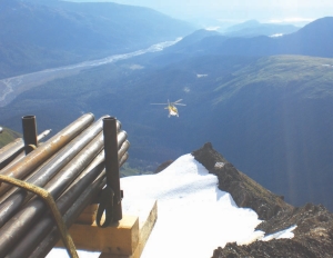 A helicopter descends from a drilling platform at Constantine Metal's Palmer polymetallic project in southeastern Alaska. The project is one of North America's newest volcanogenic massive sulphide discoveries.