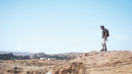 A visiting mining analyst looks out over Sunridge Gold's Adi Nefas project in Eritrea.