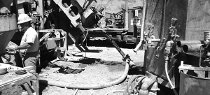 A worker tends to drilling equipment at Klondex Mines' Fire Creek project.