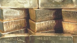 Stacked gold bars produced by Toronto-based mining giant Barrick Gold.