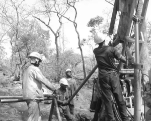 Drillers at work at Axmin's Passendro project in the Central African Republic.