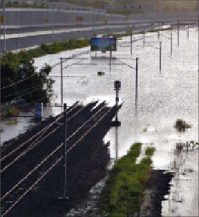 Flooded train tracks in Gailes, Queensland, Australia, just outside of Brisbane. Photo by By Martin Howard