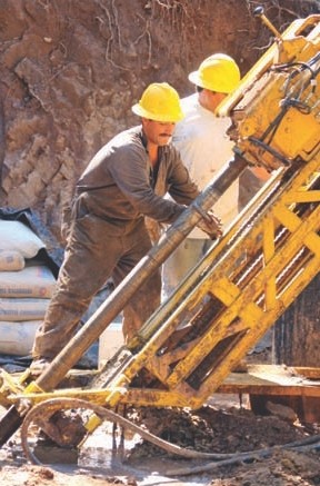 Drillers working on a rig at Paramount's San Miguel gold project.