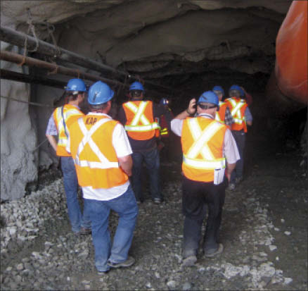 Visitors enter the mine workings at Trelawney Mining and Exploration's Chester gold project in August. Photo by Salma Tarikh