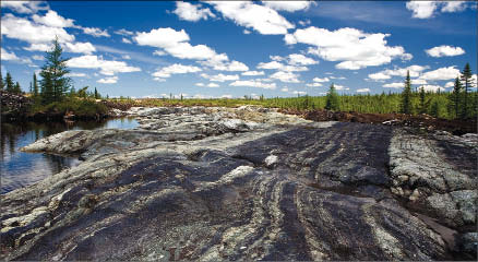 Surface mineralization at the northeastern extension of Apella Resources' Lac Dore vanadium project in Quebec.