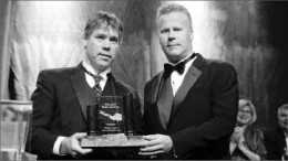 Shawn Ryan (left) receives the Bill Dennis award for prospecting success from PDAC president Scott Jobin-Bevans. Photo by Prospectors and Developers Association of Canada