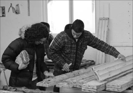 Staff examine core from Typhoon Exploration's Fayolle gold project in Quebec's Abitibi region. Photo by Typhoon Exploration