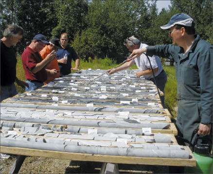 Temex Resources CEO Ian Campbell (second from left) with management and directors viewing core from the Hallnor property in Timmins, Ont. Photo by Temex Resources