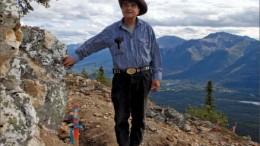 Prospector Alex McMillan stands next to his discovery vein on what is now the Main zone at Northern Tiger Resources' 3Ace gold project in the Yukon. Photo by Ian Bickis