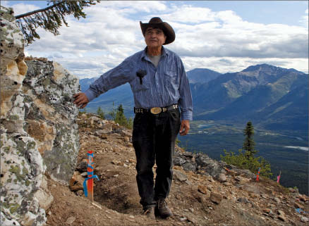 Prospector Alex McMillan stands next to his discovery vein on what is now the Main zone at Northern Tiger Resources' 3Ace gold project in the Yukon. Photo by Ian Bickis