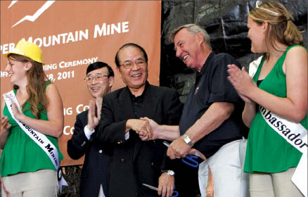 Cutting the ribbon at Copper Mountain, starting second from left: Consul General of Japan Hideki Ito; Mitsubishi Materials president and CEO Hiroshi Yao; and Copper Mountain Mining president and CEO Jim O'Rourke. Photo by Ian Bickis