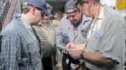 Examining core at Pacific North West Capital's River Valley PGM project in Sudbury, Ontario. From left: vice-president of exploration Ali Hassanalizadeh, project geologist Richard Zemoroz and technical advisers John Londry and Gordon Trimble. Photo by Pacific North West Capital