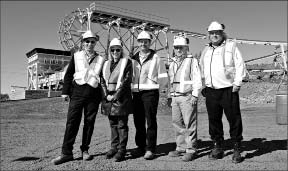 At the Copper Cliff site in Sudbury, Ont., with the Rail-Veyor in the background, from left: Mike Romaniuk, president and CEO of Rail-Veyor Technologies; Marianne Matichuk, Mayor of the City of Greater Sudbury; Jon Treen, general manager of Vale's Ontario operations; Alex Henderson, general manager of mines and mill technology for Vale's North Atlantic Region; and Peter Golde, principal engineer, research and development for Vale.