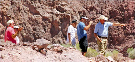 Project manager Doug Oliver (far right) accompanies investors in the open pit at Meadow Bay Gold's Atlanta gold project in Lincoln County, Nevada. Photo by Meadow Bay Gold