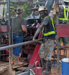 Drillers at PMI Gold's Obotan gold project in Ghana. Photo by PMI Gold