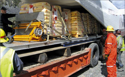 Workers unloading explosives at Canadian Zinc's Prairie Creek zinc project in the Northwest Territories. Photo by Canadian Zinc