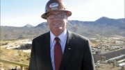 Mark Smith, Molycorp's president and CEO. For more than 24 years, Smith has been involved in the operation and development of the Mountain Pass rare earth element mine in southeastern California, seen in the background. Photo by Trish Saywell